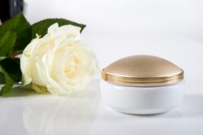 Jar of salve and a rose