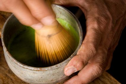 Macha green tea being prepared
