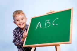 boy learning alphabetical order