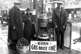 Men on Street Corner with Coal Burning Stove