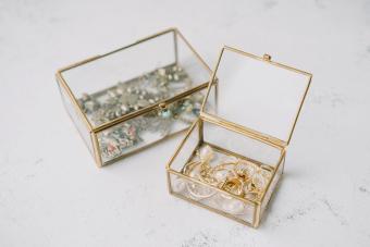 Transparent jewelry boxes with gold ornaments