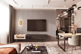 Large TV screen on the modern wall with panelling