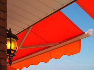 Orange fabric patio awning.