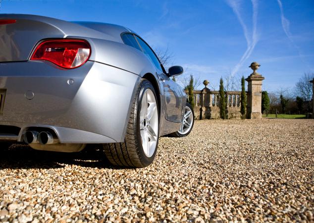 Silver sportscar in driveway