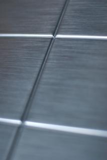 Metal wall tile