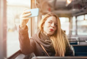 Girl posing with phone