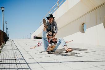 couple having fun skateboarding