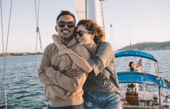 Couple enjoying view on sailboat