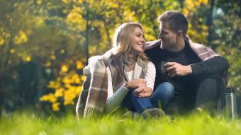 Man and woman enjoying conversation outdoors