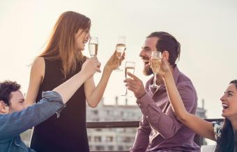 group of friends relaxing with wine 