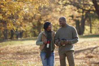 Couple walking arm in arm