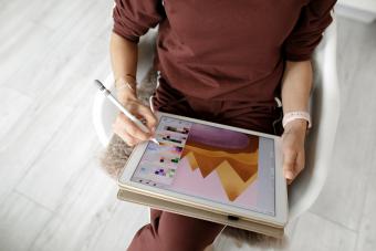 web designer using tablet at home