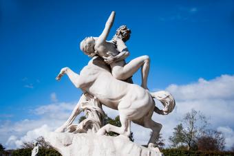 Marble statue of Centaur Nessus kidnapping Deianira