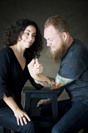 couple arm wrestling