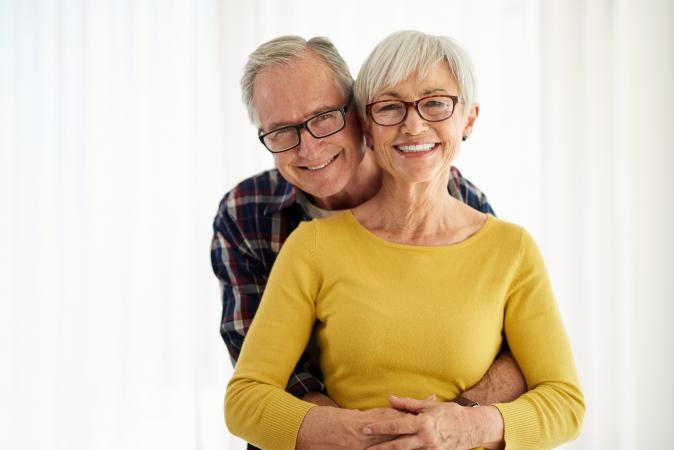 Smiling happy older couple