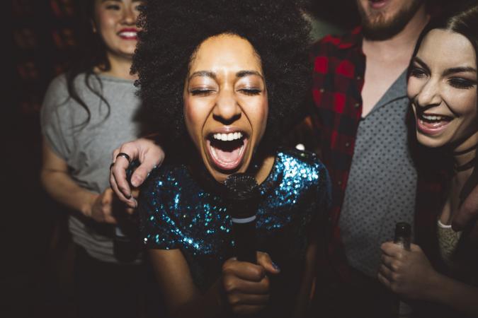 woman singing karaoke