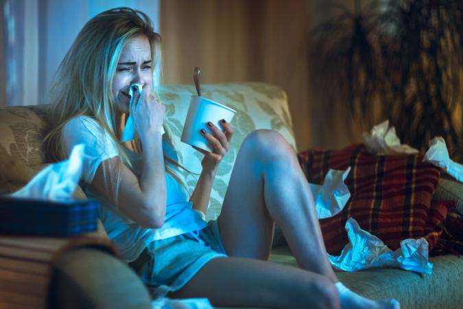 Heartbroken Girl Sitting on a Sofa