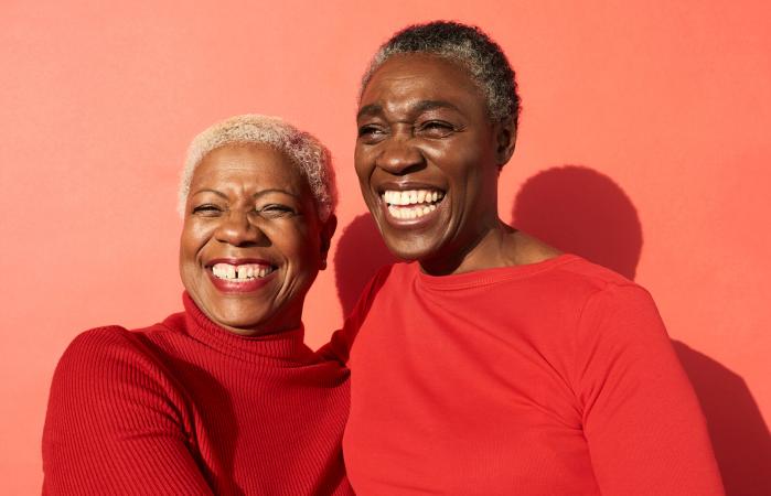 two women in red