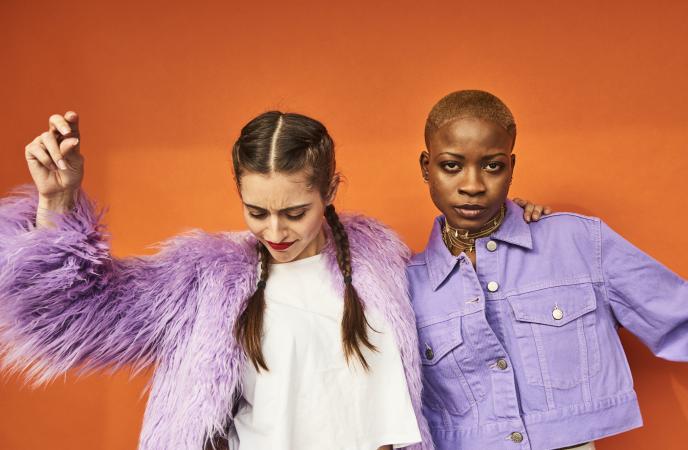 Two friends dressed in purple