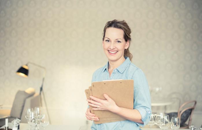 smiling female owner