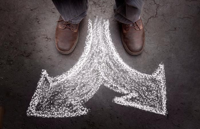 Standing man with two choices