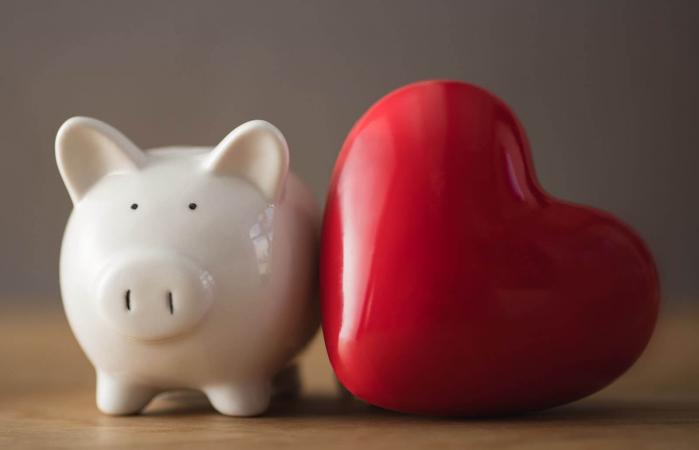 Piggy bank with red heart