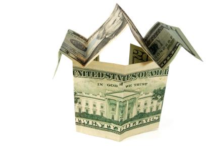 Dollar folded into a house