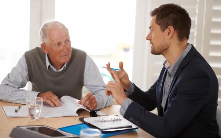 Insurance Broker Explaining Options