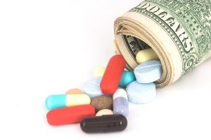Pills falling out of rolled up money