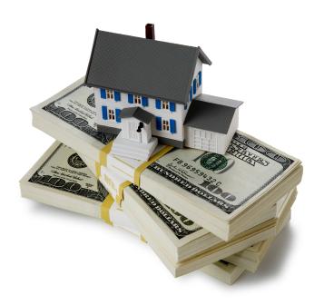 House atop wads of money