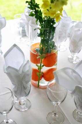 centerpiece with citrus fruit and flowers