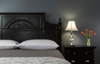 Black Painted Bed in Modern Bedroom Interior 