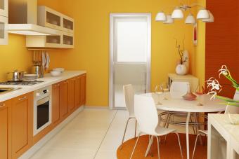 small kitchen with yellow walls