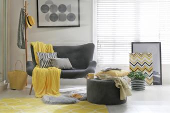 Comfortable sofa with pillows in living room