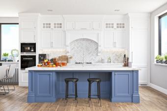 kitchen with blue island cabinets