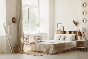 Cozy bright bedroom in rustic style