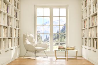 white accent chair in a home library