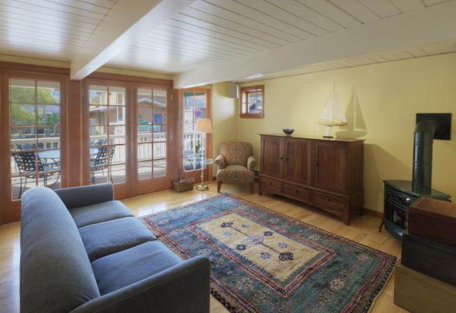 living room with arts and crafts rug