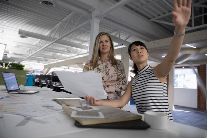 Two designers planning room design