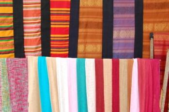 You can craft your own hanging dividers from your favorite fabric