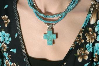 Woman With Turquoise Necklace Cross