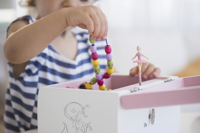 taking jewelry from jewelry box