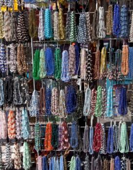 Multiple strand necklaces on display