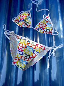 String bikini on a blue background
