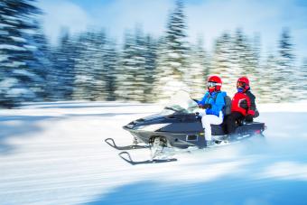 Blurry snowmobiling photo