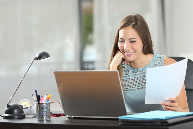 Woman taking clerical skill test