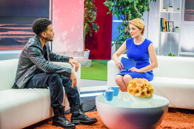 TV host interviewing guest