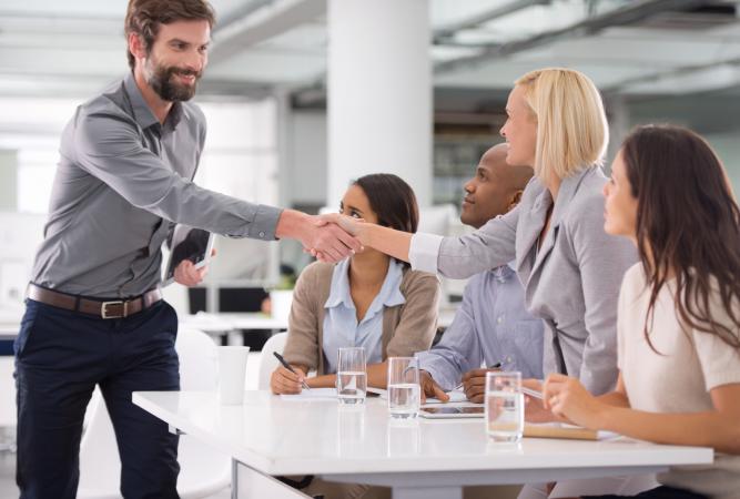 Meeting colleagues at work