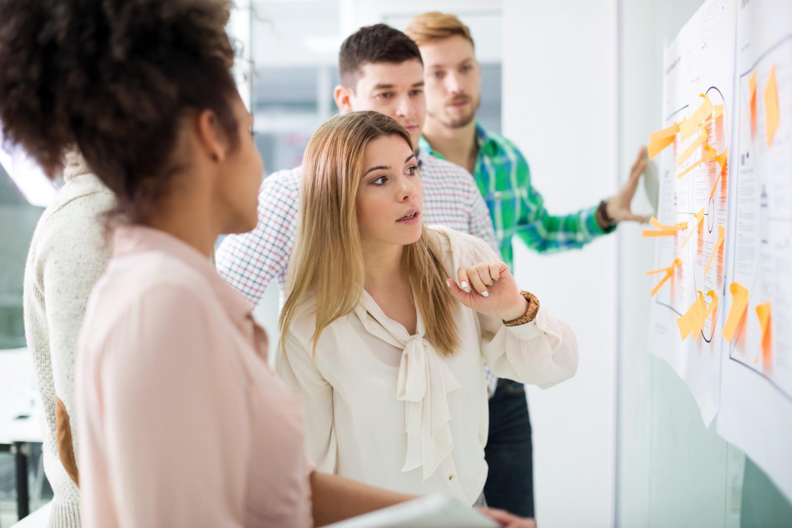 Young people working together in office