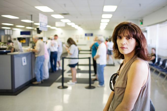 Woman in line at unemployment office